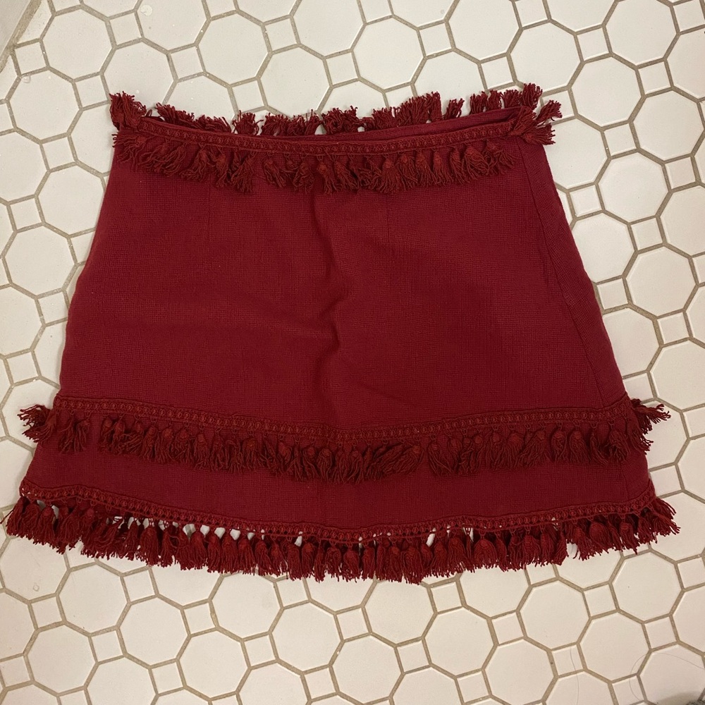 Red mini skirt with tassels